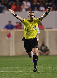 220px-Referee_Mark_Geiger_advantage.jpg