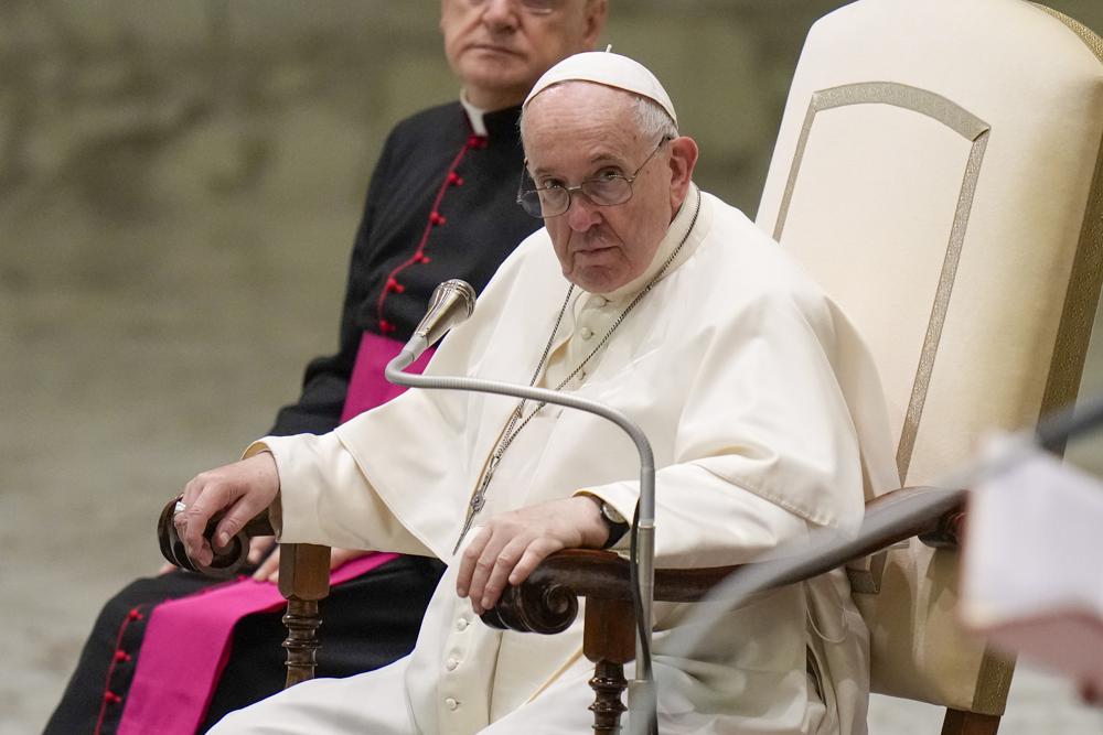 Pope Francis listens to speeches during his weekly general audience in the Pope Paul VI hall at the Vatican, Wednesday, Oct. 6, 2021. (AP Photo/Alessandra Tarantino)