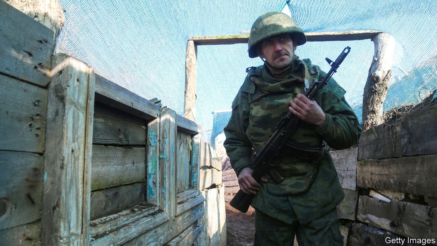 DONETSK REGION, UKRAINE FEBRUARY 15, 2022: A serviceman of the Donetsk People's Militia stationed on the front line near the rural town of Staromikhailovka, west of Donetsk. Valentin Sprinchak/TASS (Photo by Valentin Sprinchak\TASS via Getty Images)