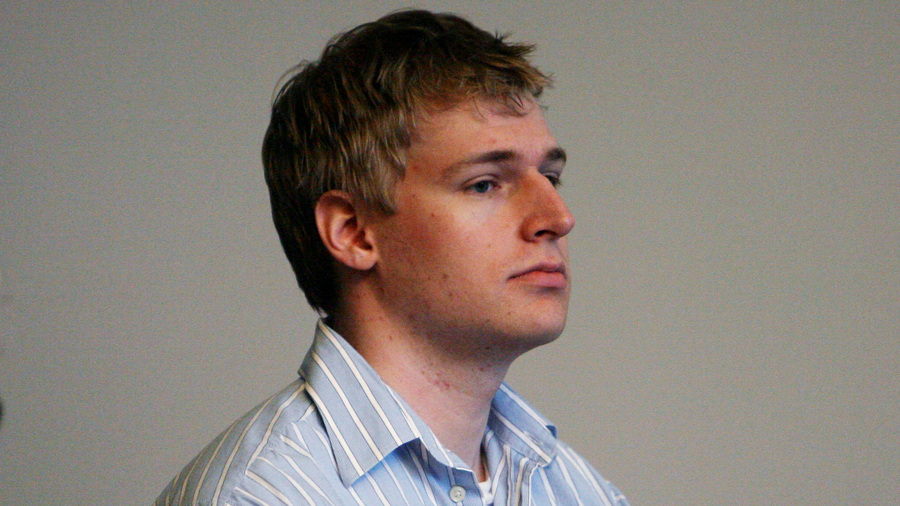 Boston University medical student Philip Markoff stands during his arraignment in Boston Municipal Court, Tuesday, April 21, 2009, in Boston. Markoff has been ordered held without bail on charges that he fatally shot a masseuse he had lured to his hotel through Craigslist. (AP Photo/Mark Garfinkel, Pool)