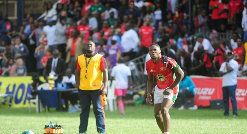 NAIROBI, KENYA - JUNE 30: In this handout image provided by the APO Group, Kenya's Darwin Mukidza takes a conversion as Kenya Simbas beat Zimbabwe Sables 45-36 during the Rugby World Cup qualifier and Rugby Africa Gold Cup match between Kenya and Zimbabwe at RFUEA Ground on June 30, 2018 in Nairobi, Kenya. (Photo by APO Group via Getty Images)